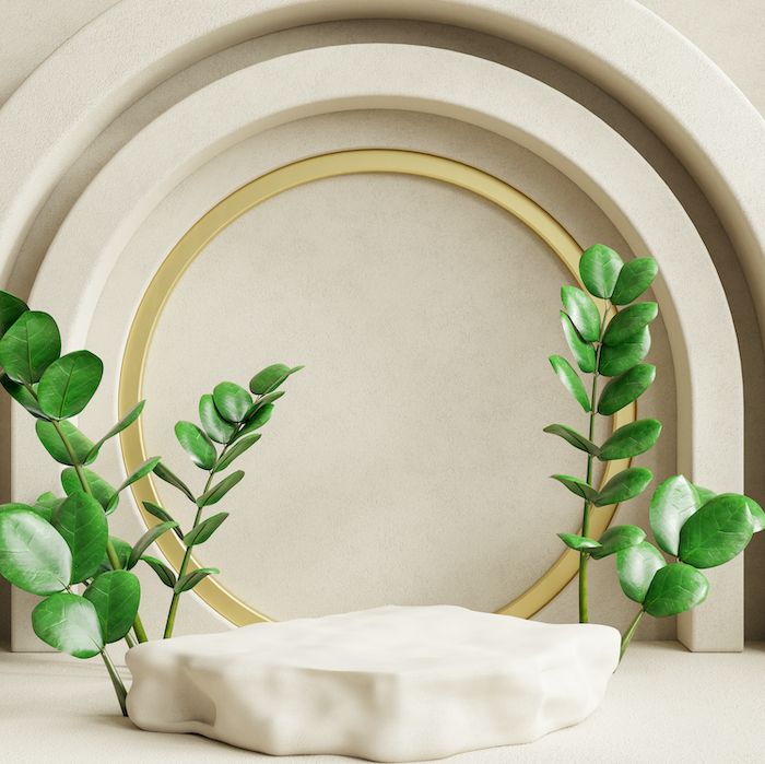 Visuel 3D réaliste d'un socle de pierre beige entouré de verdure