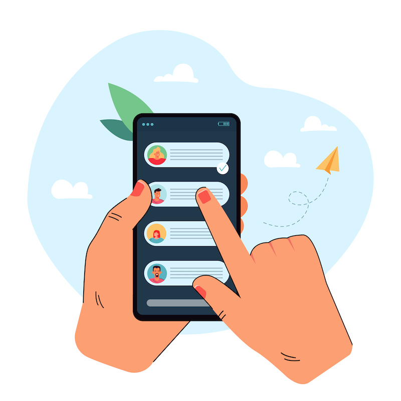 Hand holding mobile phone with chat messages